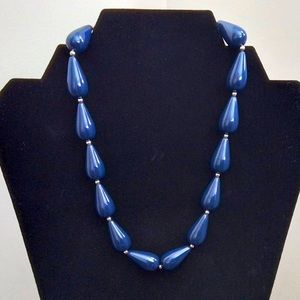 Navy blue teardrop bead necklace.